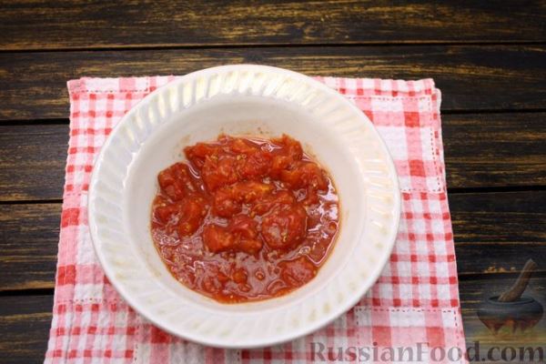 Рыбный суп с рисом, консервированными помидорами  и сливками