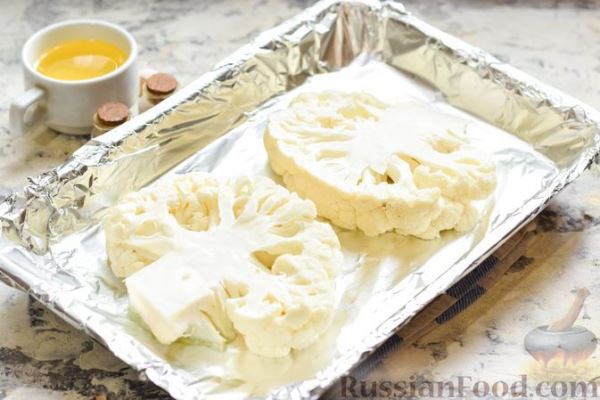 Цветная капуста, запечённая с минтаем под сметанно-томатным соусом